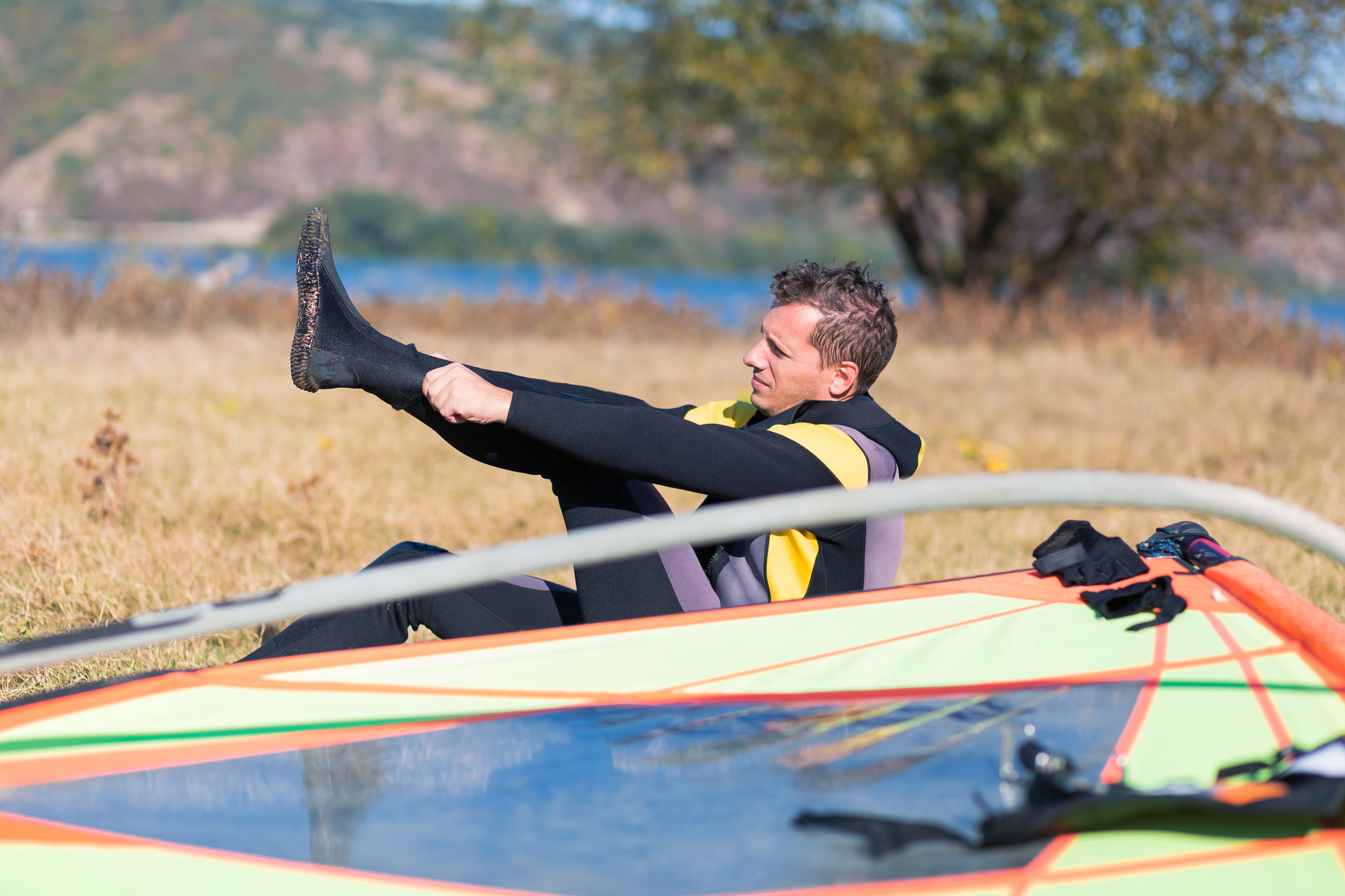 Which is Best for Wetsuit Changing? Changing Bags vs. Grass Mats vs. Buckets